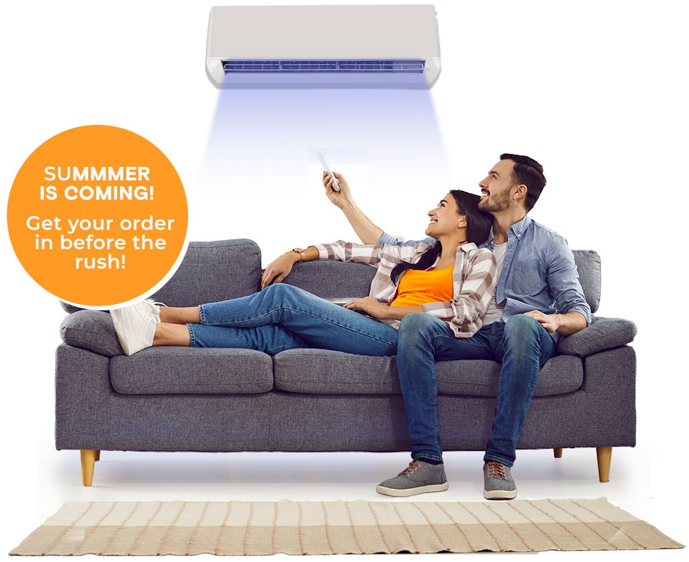 Couple on sofa with Breezi airconditioning by Panasonic